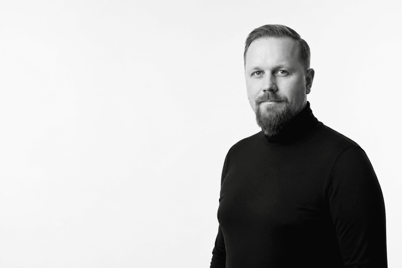 AI-edited black-and-white portrait of Ville Ylläsjärvi in a black turtleneck